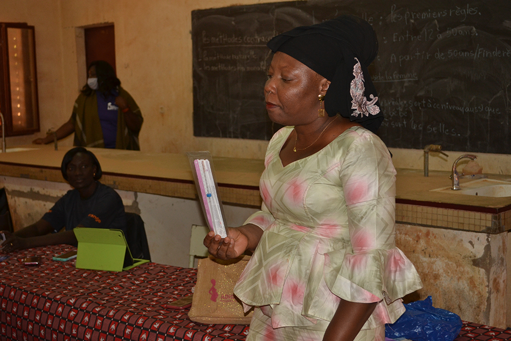 Menstrual Health Training Program volunteer Sakande Koanda Sonata at our menstrual education workshop in Burkina Faso, West Africa.