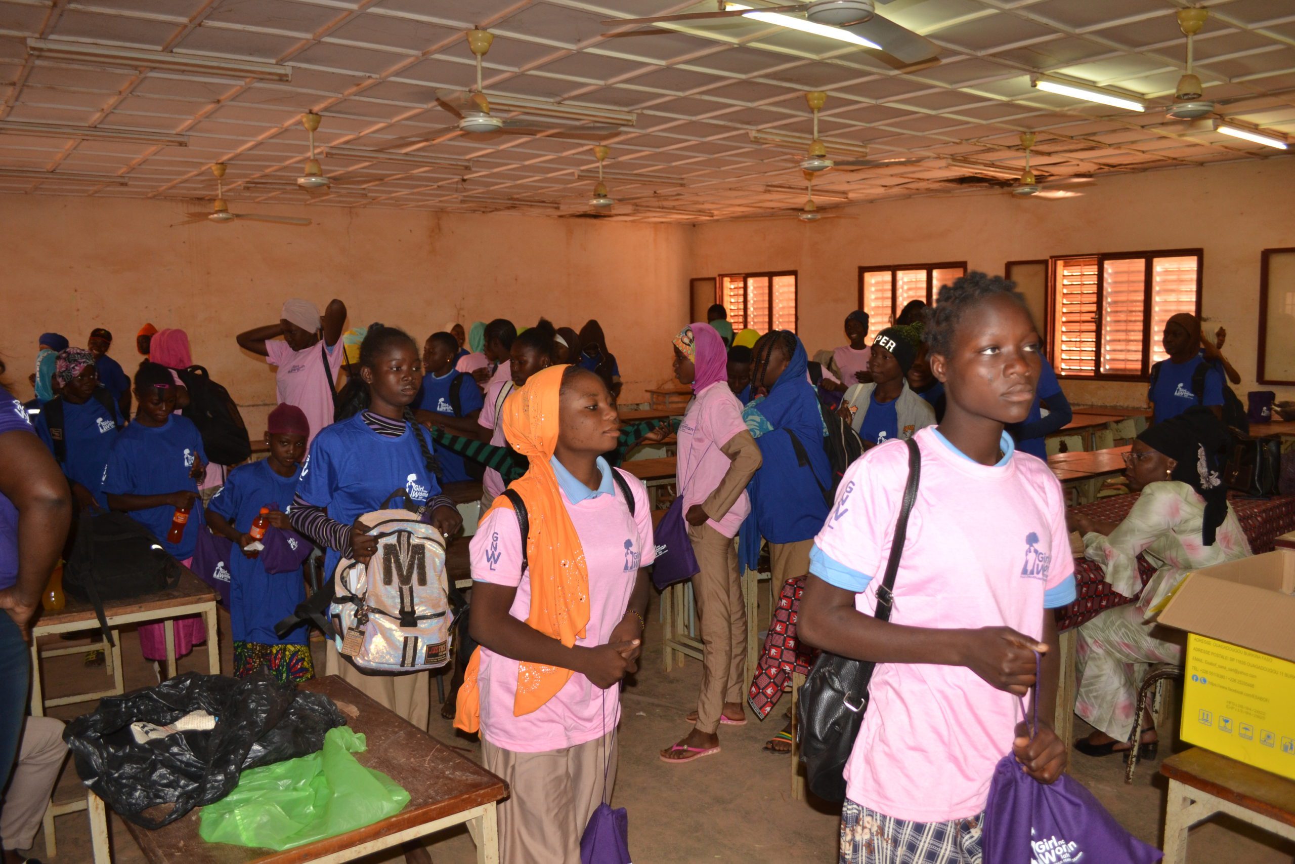 Girls finalizing there menstrual cycle lesson, getting ready, packing up to go home.