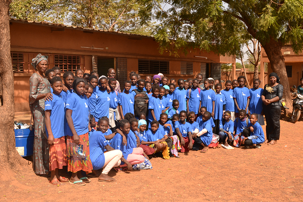Group picture of girls at our period education workshop in Nord-C school in Burkina Faso, West Africa.